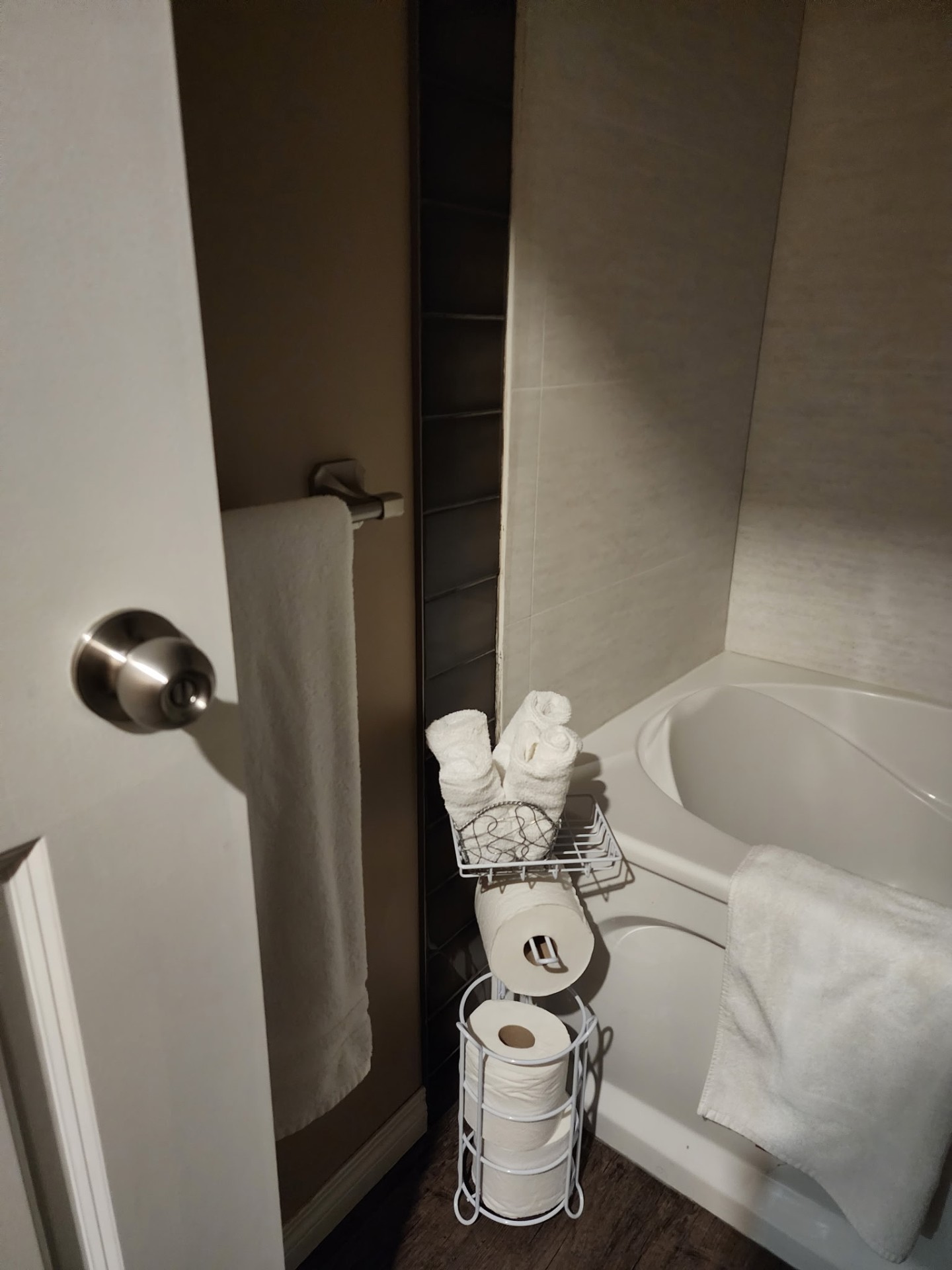 Neatly staged bathroom nook with fresh towels